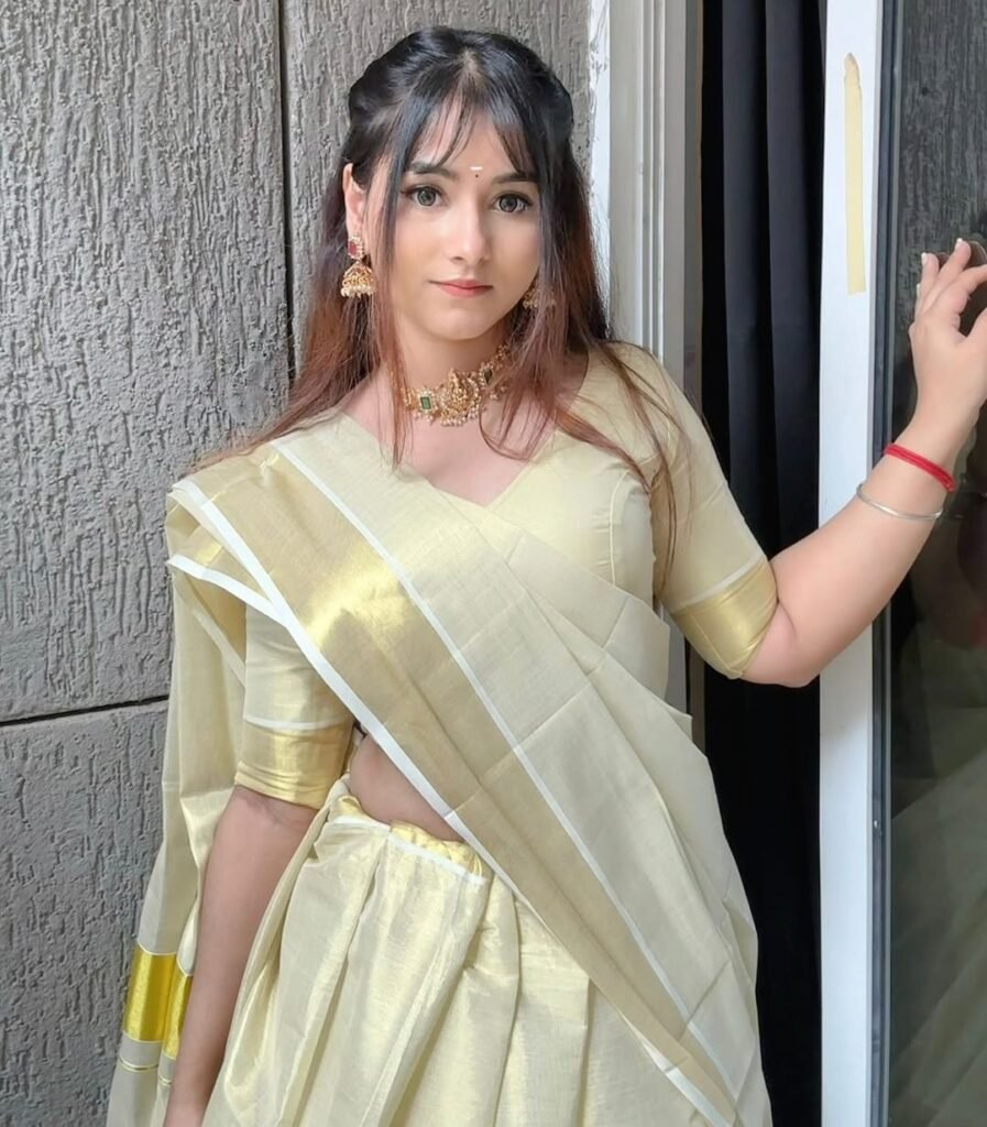 Draped in culture, glowing in gold.✨❤️....#explore #explorepage #saree #southindian #explorepage - Biography Latest